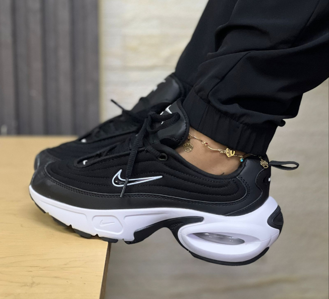 Imagen https://storemanizales.com/images/large/Nike Portal Negros Mujer